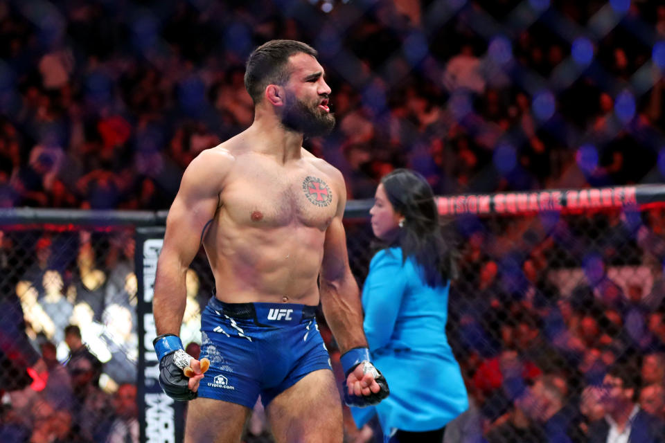 Nov 11, 2023; New York, NY, USA; Benoit Saint Denis (blue gloves) reacts after beating Matt Frevola (red gloves) during UFC 295 at Madison Square Garden. Mandatory Credit: Wendell Cruz-USA TODAY Sports