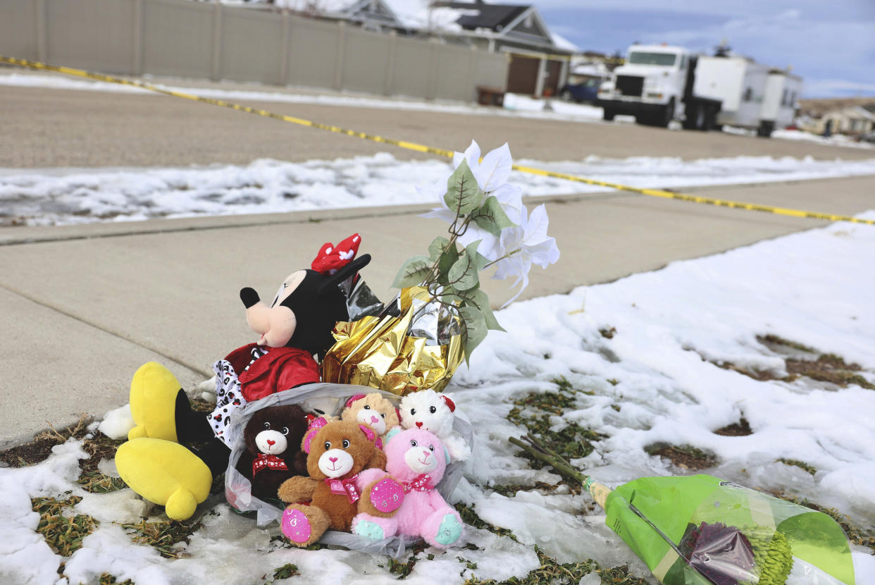 Five stuffed animals left by the the Enoch Elementary School PTA are pictured at a makeshift memorial near the police tape at a home where eight members of a family were killed in Enoch, Utah, on Thursday, Jan. 5, 2023. (Laura Seitz/The Deseret News via AP)