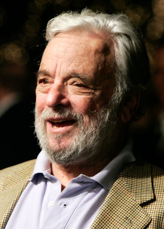 Stephen Sondheim poses as he arrives at a special screening of the film "Sweeney Todd The Demon Barber of Fleet Street" in Hollywood