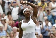 Serena Williams of the U.S.A. celebrates after winning her match against Timea Babos of Hungary at the Wimbledon Tennis Championships in London, July 1, 2015. REUTERS/Toby Melville