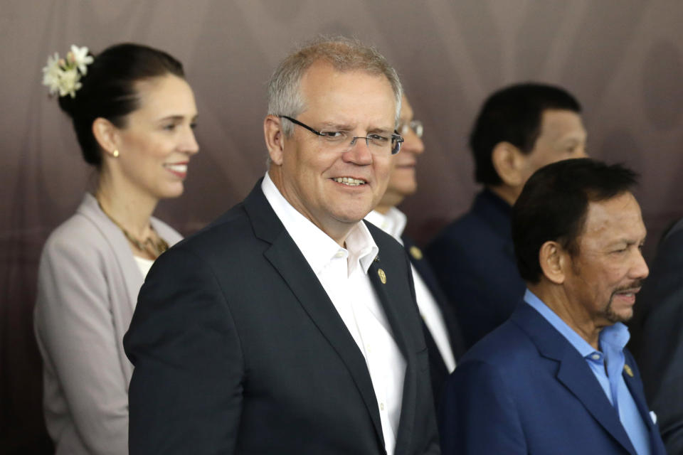 FILE - In this Nov. 18, 2019, file photo, Australia's Prime Minister Scott Morrison, center, poses for a group photo at APEC Haus in Port Moresby, Papua New Guinea. Australia. Saturday, May 18, 2019 is the last possible date that Morrison could have realistically chosen to hold an election. (AP Photo/Mark Schiefelbein, File)