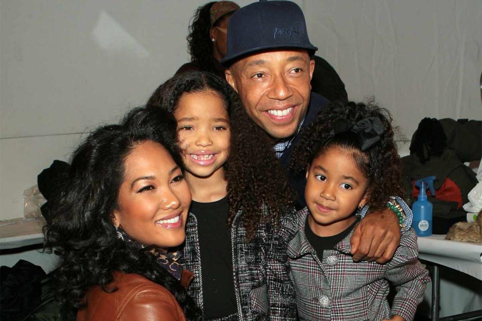 <p>Jemal Countess/WireImage</p> Kimora Lee Simmons, Ming Lee Simmons, Russell Simmons, and Aoki Lee Simmons 