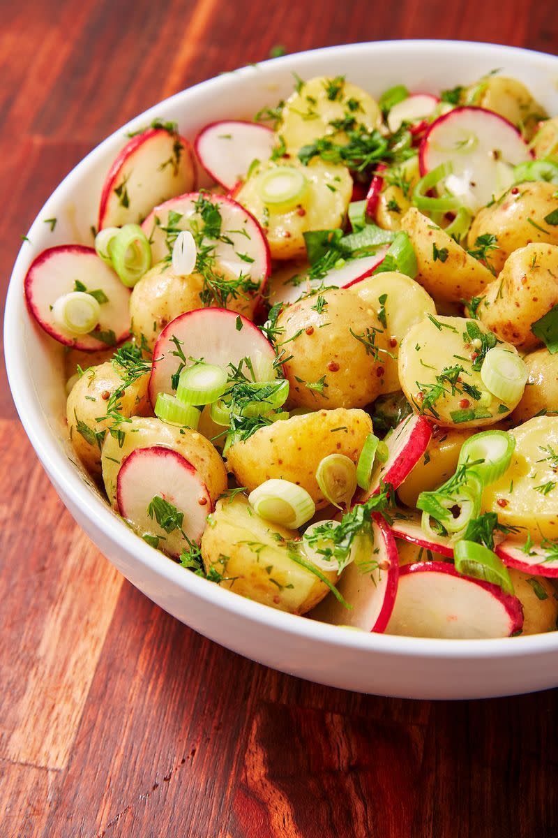 <p>A classic potato salad generally consists of lashings of mayonnaise, but if you're looking to eliminate that mayonnaise for a <a href="https://www.delish.com/uk/healthy-recipes/" rel="nofollow noopener" target="_blank" data-ylk="slk:healthier;elm:context_link;itc:0;sec:content-canvas" class="link ">healthier</a> version, or in need of a <a href="https://www.delish.com/uk/vegan-recipes/" rel="nofollow noopener" target="_blank" data-ylk="slk:vegan;elm:context_link;itc:0;sec:content-canvas" class="link ">vegan</a> potato salad, then this recipe is for you. Simply combining a few ingredients to make a gorgeous salad dressing, we've added dill, parsley and radish to stir through with the potatoes. Perfect in the summer with some <a href="https://www.delish.com/uk/cooking/recipes/a29205217/best-bbq-salmon-recipe/" rel="nofollow noopener" target="_blank" data-ylk="slk:BBQ grilled salmon;elm:context_link;itc:0;sec:content-canvas" class="link ">BBQ grilled salmon</a>, or <a href="https://www.delish.com/uk/food-news/a28961080/how-to-cook-steak/" rel="nofollow noopener" target="_blank" data-ylk="slk:steak;elm:context_link;itc:0;sec:content-canvas" class="link ">steak</a>.</p><p>Get the <a href="https://www.delish.com/uk/cooking/recipes/a30438329/potato-salad/" rel="nofollow noopener" target="_blank" data-ylk="slk:Healthy Potato Salad;elm:context_link;itc:0;sec:content-canvas" class="link ">Healthy Potato Salad</a> recipe.</p>