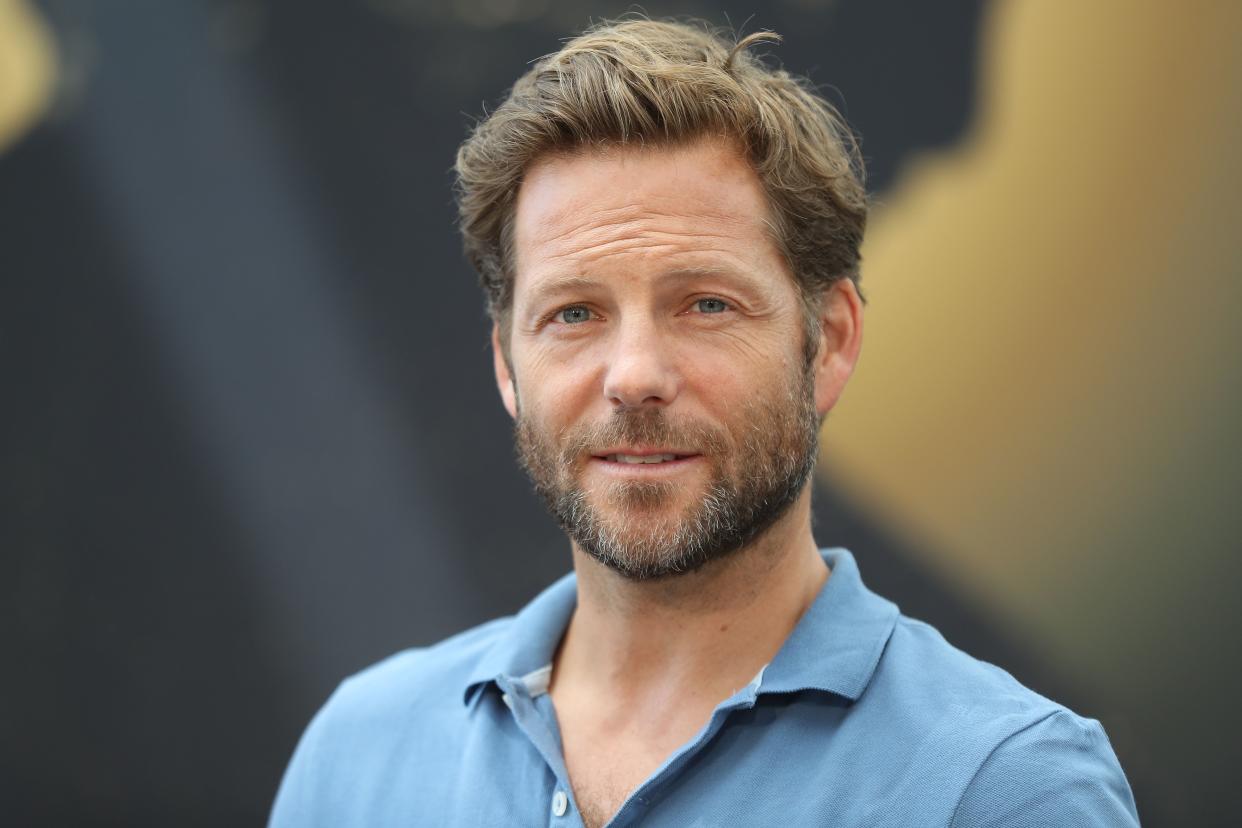 British actor Jamie Bamber poses during a photocall 