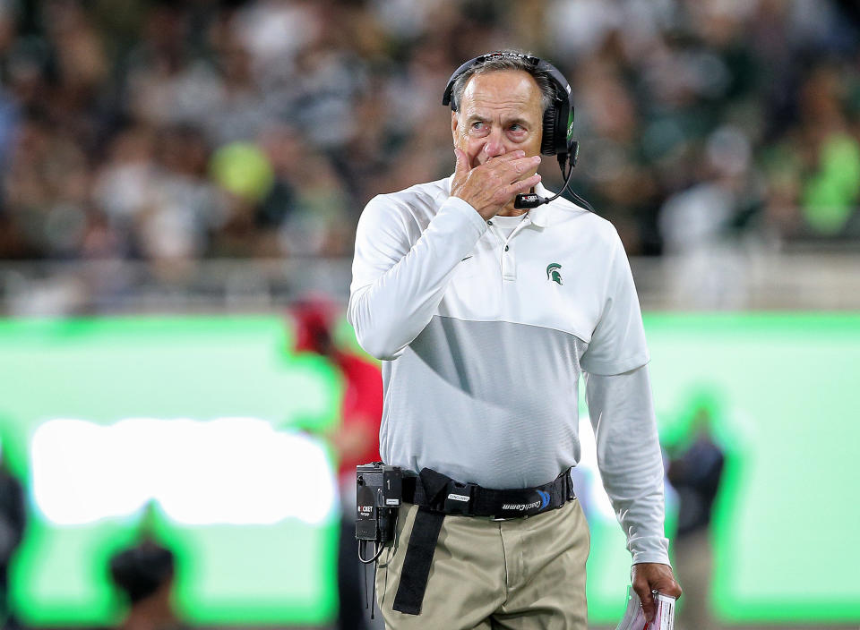 Michigan State Spartans head coach Mark Dantonio stands on the field during the second half of a game against the Western Michigan Broncos. (USAT)