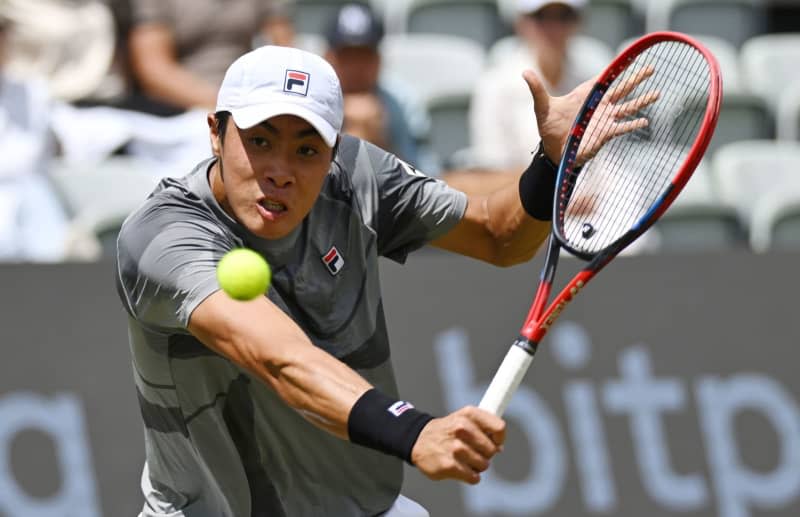 American tennis player Brandon Nakashima in action against Great Britain's Jack Draper during their men's singles semi-final match of the Stuttgart Open tournament. Marijan Murat/dpa