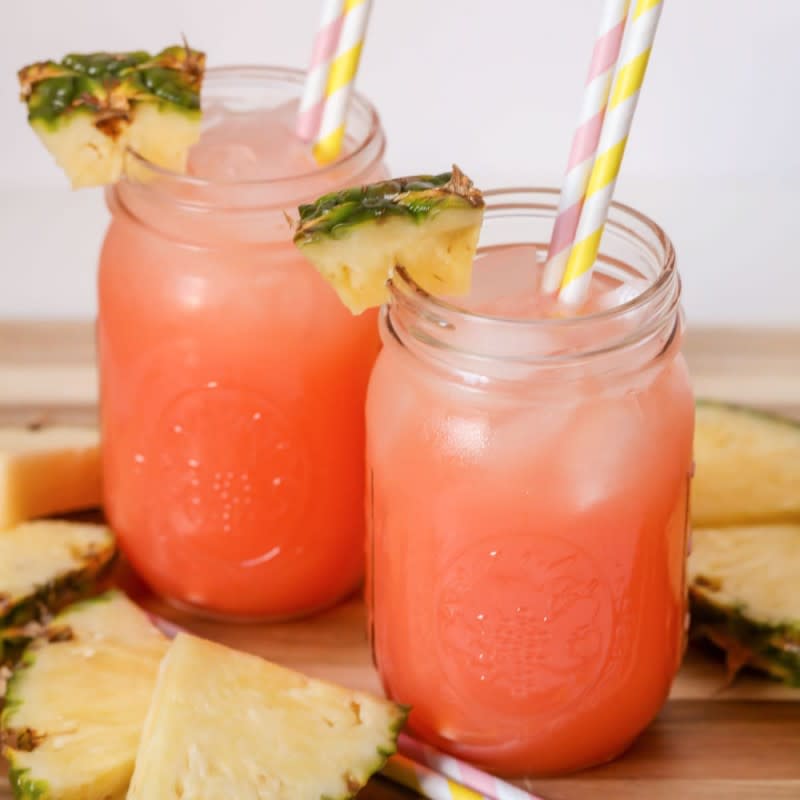 <p>This Pink Drink Recipe takes a minute to make and is made with 3 simple ingredients: powdered pink lemonade, Sprite, and pineapple juice.</p><p><strong>Get the recipe: <a href="https://lilluna.com/pineapple-pink-lemonade-soda/" rel="nofollow noopener" target="_blank" data-ylk="slk:Pineapple Pink Lemonade Punch;elm:context_link;itc:0;sec:content-canvas" class="link ">Pineapple Pink Lemonade Punch</a></strong></p>