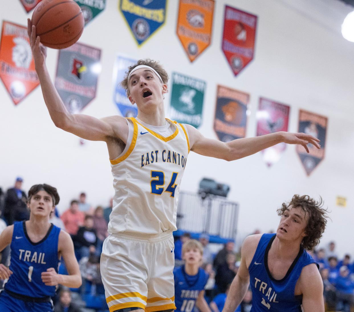 East Canton's Caleb Shilling grabs control of the basketball vs. Buckeye Trail, Tuesday, Jan. 30, 2024.