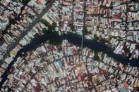 Ho Chi Minh City boasts large sprawling communities living along polluted waterways