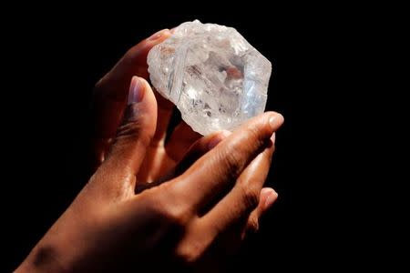 A model displays the 1109 carat "Lesedi La Rona" diamond at Sotheby's in the Manhattan borough of New York, U.S., May 4, 2016. REUTERS/Lucas Jackson