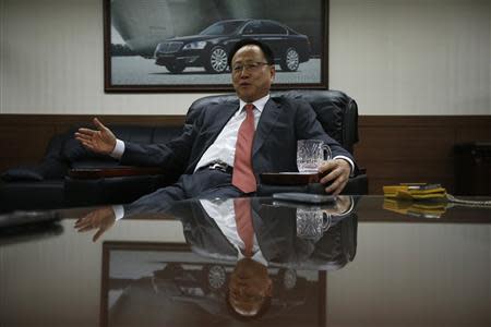 Lee Yoo-il, President and CEO of Ssangyong Motor Co, speaks during an interview with Reuters at his office in Seoul December 10, 2013. REUTERS/Kim Hong-Ji