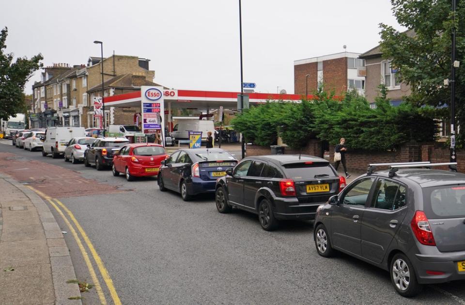 Motorists queue at an Esso petrol station in Brockley, south London (Dominic Lipinski/PA) (PA Wire)