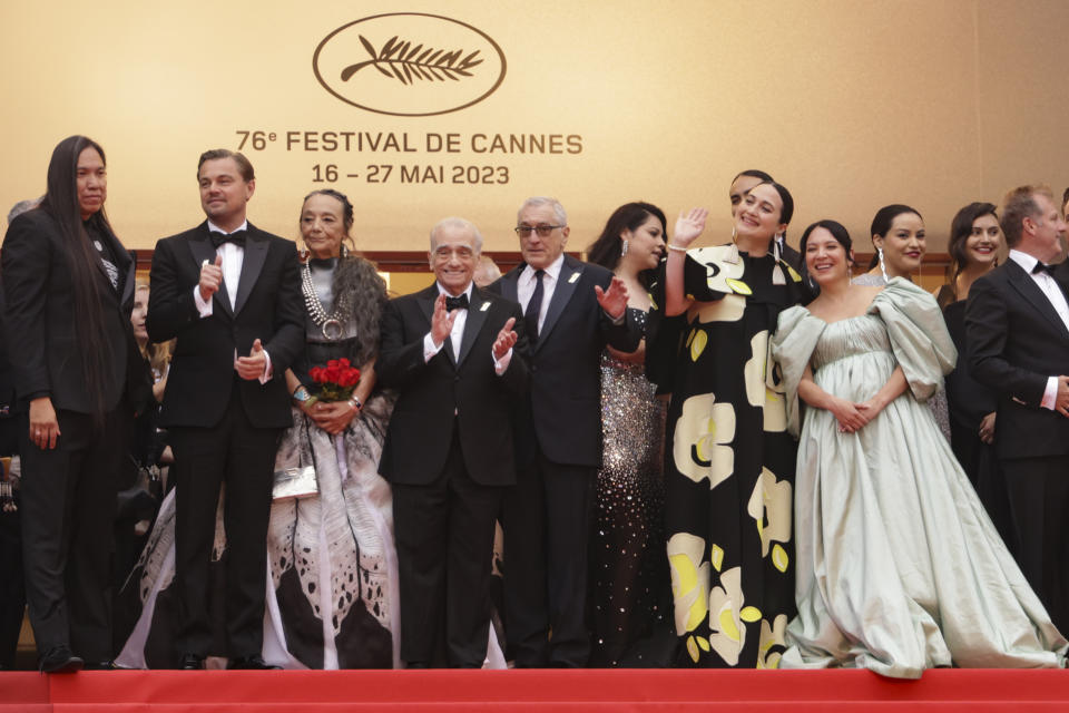 William Belleau, from left, Leonardo DiCaprio, Tantoo Cardinal, director Martin Scorsese, Robert De Niro, Cara Jade Myers, Lily Gladstone, and Jillian Dion pose for photographers upon arrival at the premiere of the film 'Killers of the Flower Moon' at the 76th international film festival, Cannes, southern France, Saturday, May 20, 2023. (Photo by Vianney Le Caer/Invision/AP)