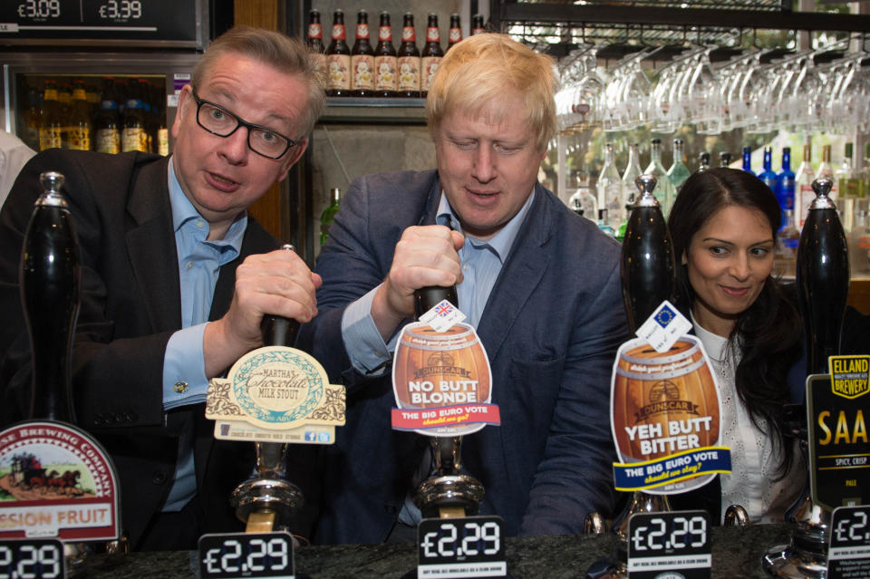 Michael Gove, Boris Johnson (centre) and Priti Patel pull pints of beer at the Old Chapel pub in Darwen in Lancashire, as part of the Vote Leave EU referendum campaign.