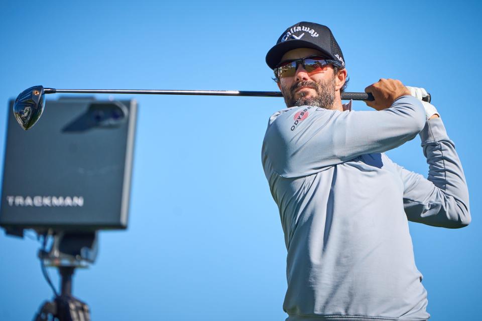 Adam Hadwin tees off on the third hole during round one of the WM Phoenix Open at TPC Scottsdale on Feb. 9, 2023.
