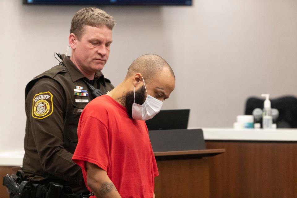 Darrell Brooks Jr. is seen from a court appearance in April. He is charged with killing six people and injuring more than 60 after plowing through the Waukesha Christmas Parade with his sport utility vehicle on Nov. 21. Brooks recently changed his plea to not guilty by reason of mental defect and will be examined by three doctors as part of that plea.