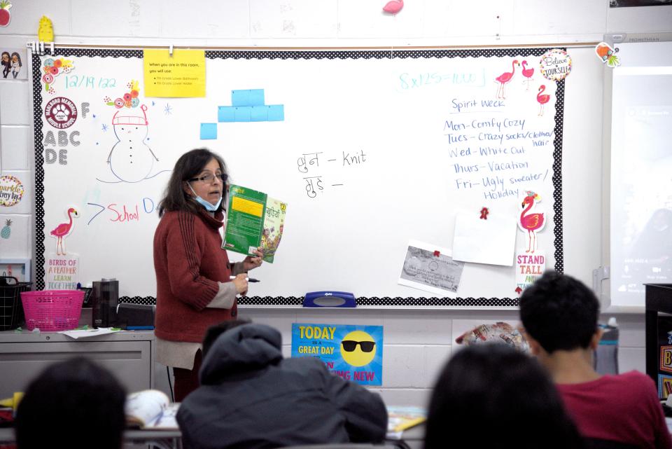 Neelu Peshori teaches her Intermediate I class on Saturday, December 17, 2022 at Marlboro Memorial Middle School in Marlboro, New Jersey. The Marlboro Hindi School services students 5-16. Some students who complete the advance classes stay to volunteer as teaching assistants before going to college.