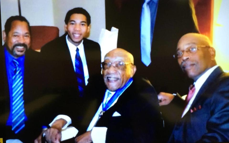 Golf pioneer Charles Sifford after being awarded the Presidential Medal of Freedom from former President Barack Obama.