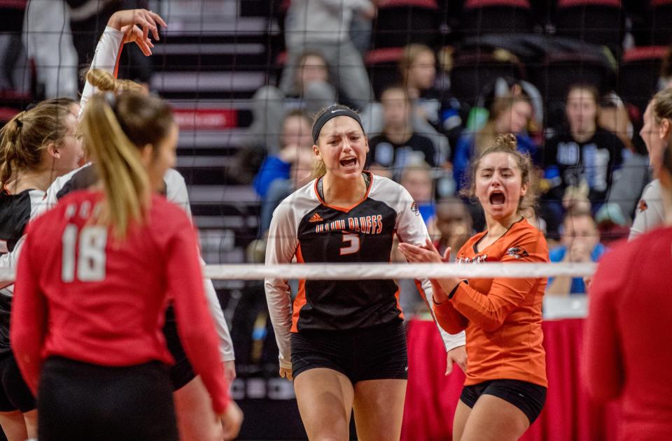 Illini Bluffs' Hanna Hicks (3) and Taylor Purdy celebrate a point against Norris City-Omaha-Enfield during their Class 1A volleyball state semfinal Friday, Nov. 15, 2019 at Redbird Arena in Normal. Illini Bluffs won in straight sets 25-19, 25-22 to advance to Saturday's title game.