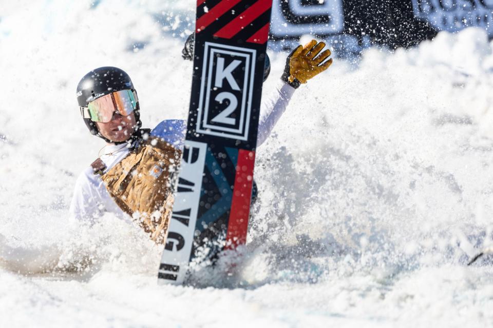 A snowboarder crashes after coming off a jump during the 2024 Utah Skijoring competition at the Wasatch County Event Complex in Heber City on Saturday, Feb. 17, 2024. | Marielle Scott, Deseret News