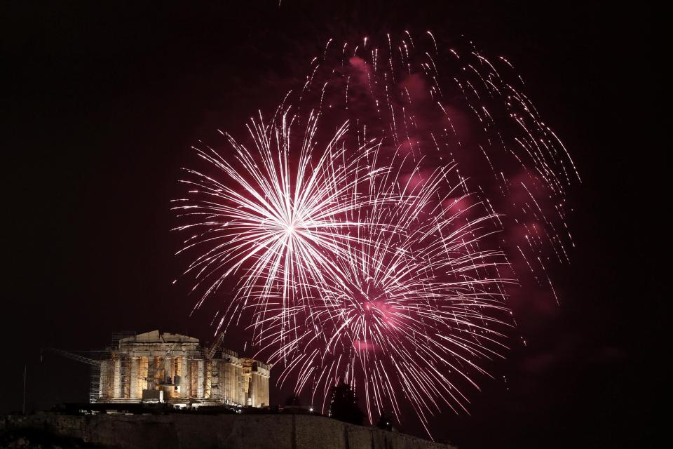 Fireworks explode over the temple of the Parthenon during New Year celebrations in Athens, Greece January 1, 2013.