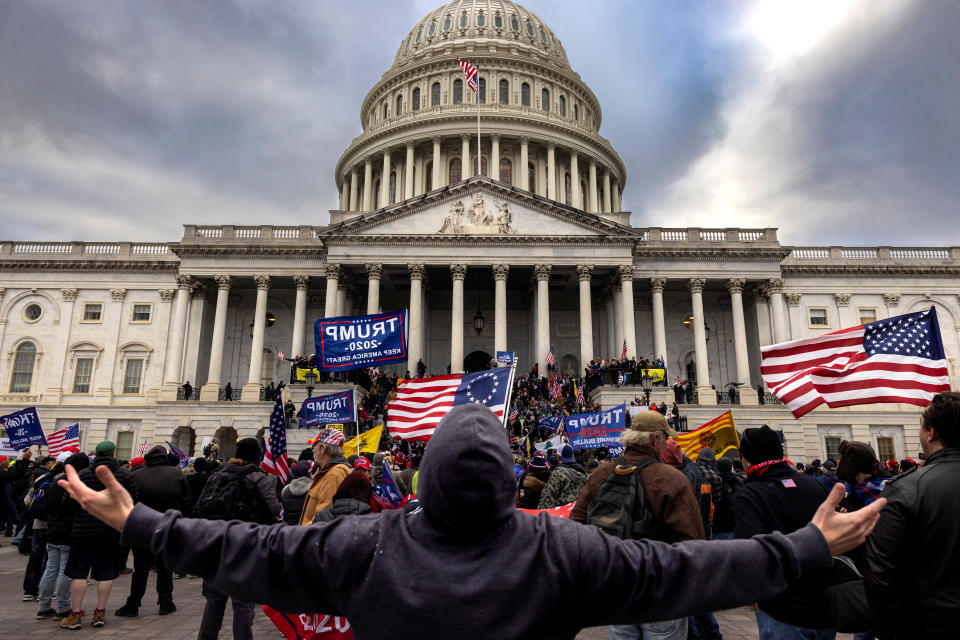 A mob of unambiguous Trump supporters stands outside the Capitol on Jan. 6. (Photo: Brent Stirton via Getty Images)