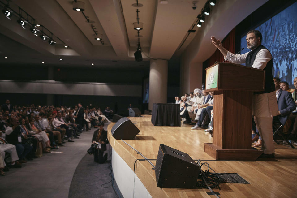 Indian politician Rahul Gandhi, right, speaks at the Javits Center, Sunday, June 4, 2023, in New York. (AP Photo/Andres Kudacki)