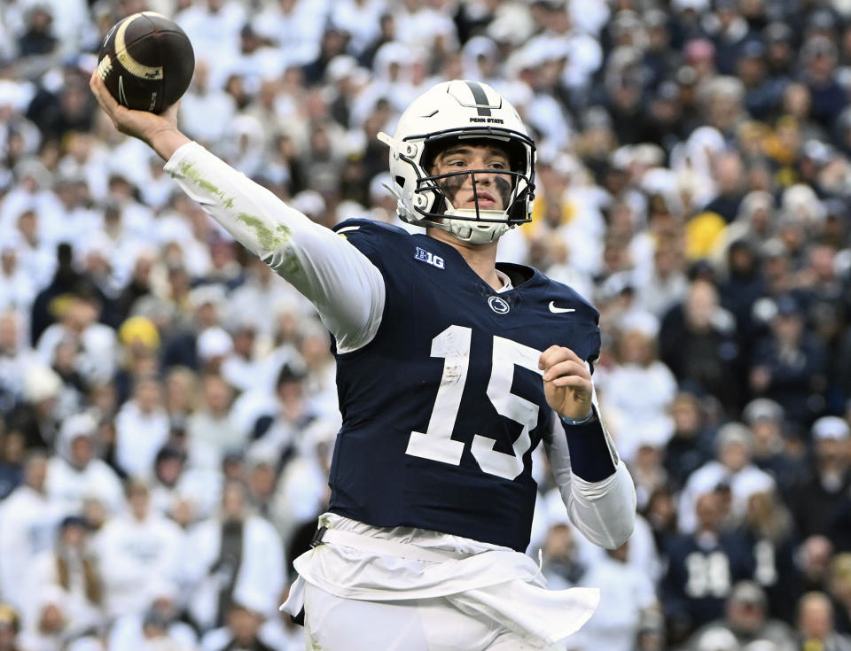 FILE - Penn State quarterback Drew Allar passes against Michigan during the second half of an NCAA college football game Nov. 11, 2023, in State College, Pa. Mississippi will play for the first 11-win season in school history when the Rebels of the Southeastern Conference, led by quarterback Jaxson Dart, face Penn State, led by Allar, in the Peach Bowl, Saturday, Dec. 30, 2023. (AP Photo/Barry Reeger, File)