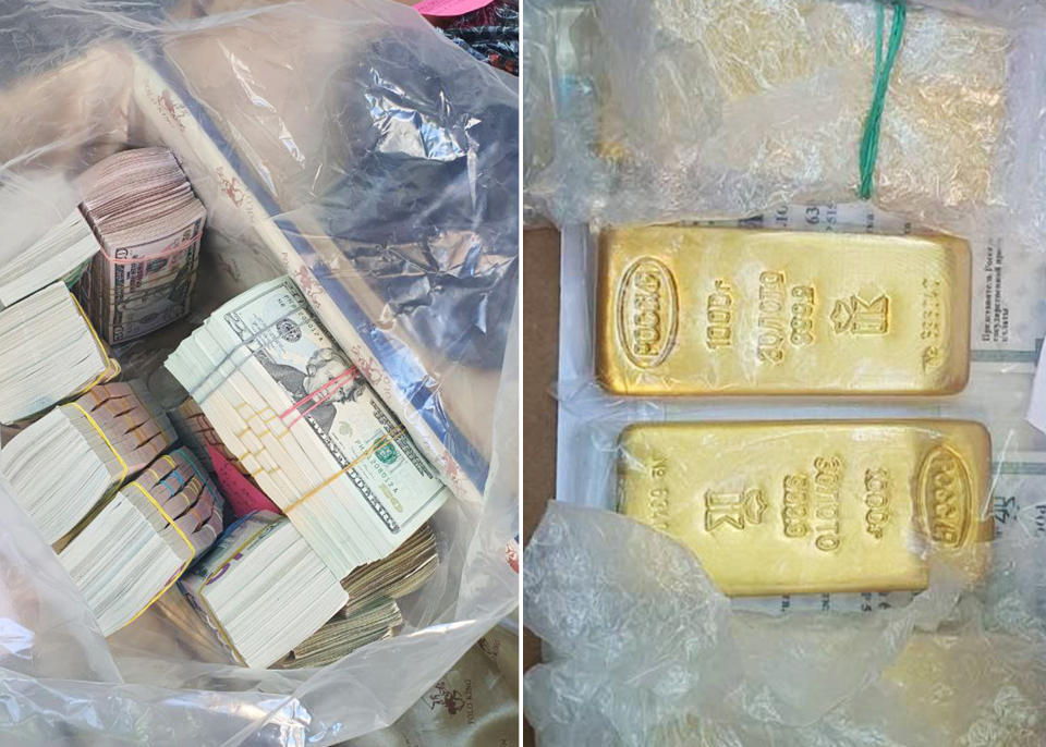 Wads of U.S. dollars and gold bars were seized during the raid.  (Izvestia)