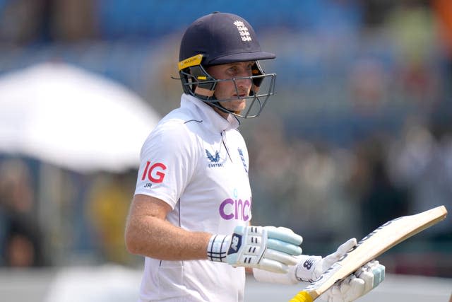 Joe Root walks off the field at the lunch break