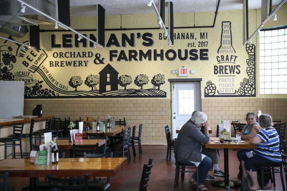 Customers dine at Lehman’s Orchard Brewery & Farmhouse in Buchanan.