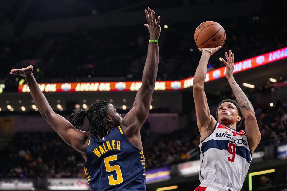 Washington Wizards guard Ryan Rollins (9) shoots the ball against Indiana Pacers forward Jarace Walker (5) on Wednesday, Oct. 25, 2023, during the game at Gainbridge Fieldhouse in Indianapolis. The Indiana Pacers defeated the Washington Wizards, 143-120.