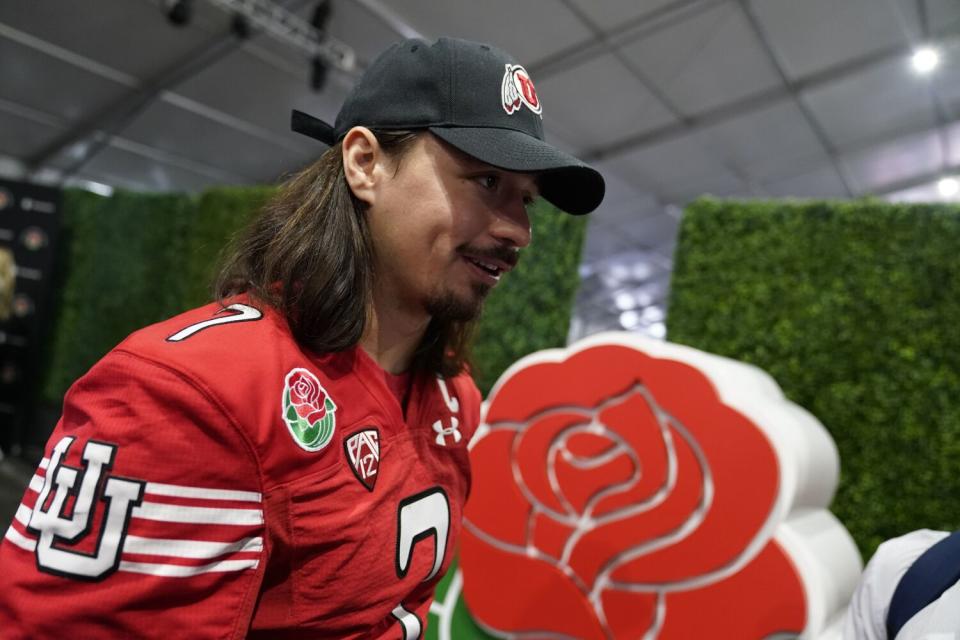 Utah quarterback Cameron Rising answers questions during media day on Saturday.