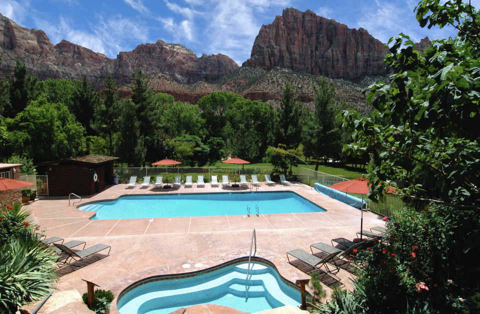 pool with mountains behind it