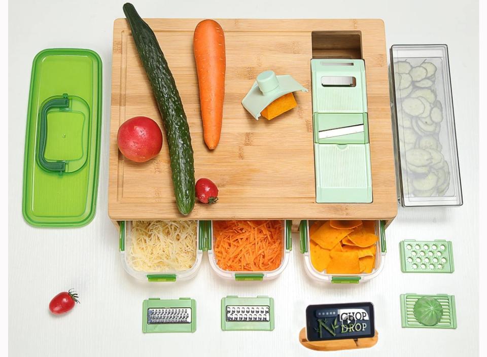 A cutting board with built-in slicing blade options and storage space makes prep work faster and easier. (Source: Amazon)