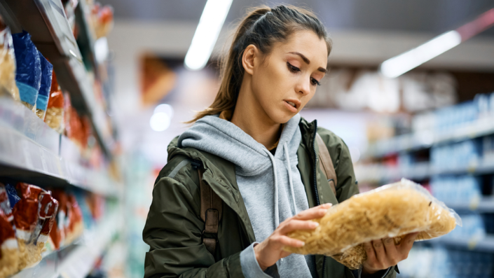 Woman shopping for pasta