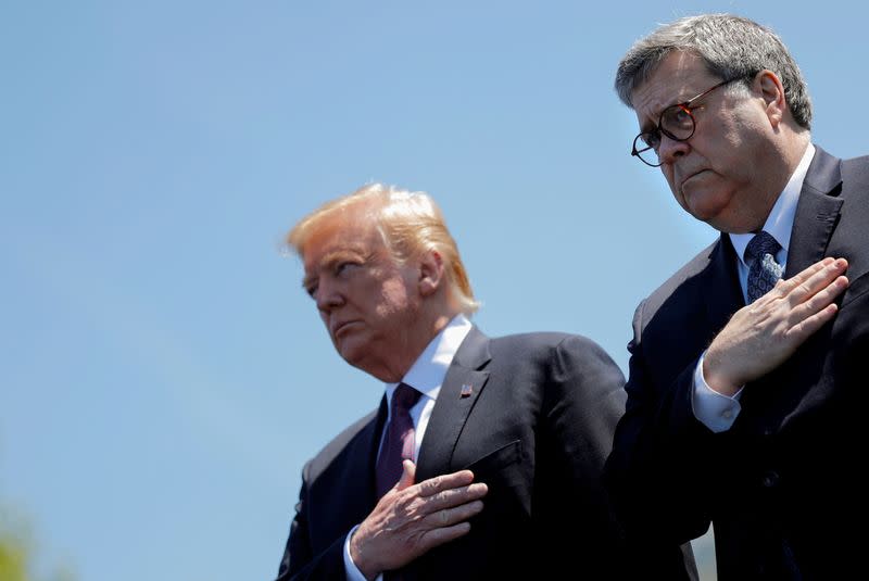FILE PHOTO: U.S. President Donald Trump and U.S. Attorney General William Barr attend the 38th Annual National Peace Officers Memorial Service on Capitol Hill in Washington