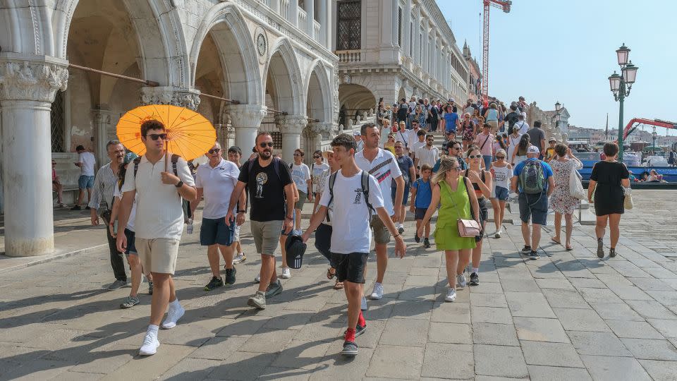 Venice daytrippers are charged an entry fee to the city on peak days. Now other places in Italy are also adopting charges. - Stefano Mazzola/Getty Images