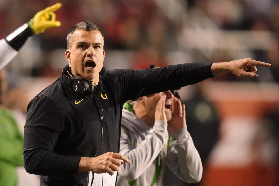 Oregon head coach Mario Cristobal shouts in the second half during an NCAA college football game against Utah, Saturday, Nov. 20, 2021, in Salt Lake City. (AP Photo/Rick Bowmer)