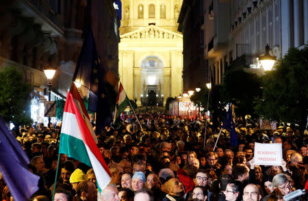 People attend a rally outside George Soros's Central European University to protest against the university being forced out of Budapest by Prime Minister Viktor Orban's government in Budapest, Hungary, October 26, 2018. REUTERS/Bernadett Szabo