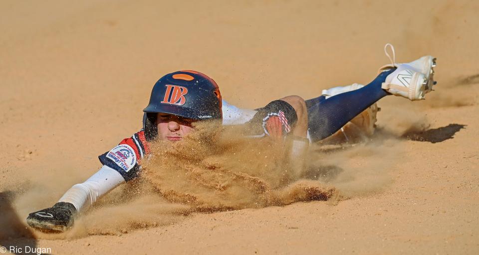 Hagerstown's Aidan Secrest slides into third base with a stolen base against the Johnstown Sherry's Bulldogs on the opening day of the Pony 13 East Zone tournament. Hagerstown won 8-2.