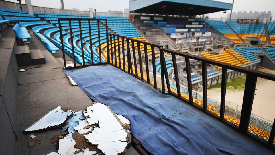The beach volleyball stadium now lies rotting and disused. (Greg Baker/AFP via Getty Images)