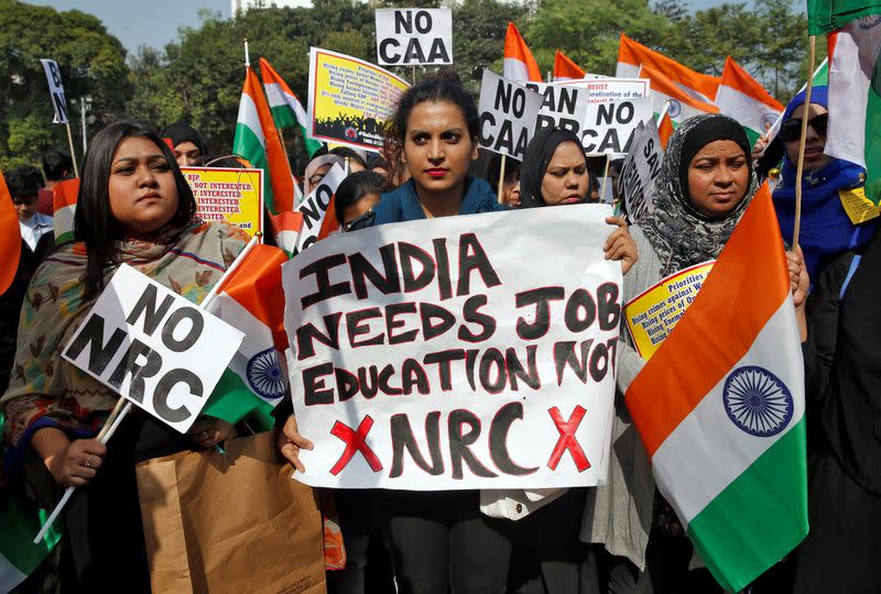 Demonstrators attend a protest march against the National Register of Citizens and a new citizenship law, in Kolkata