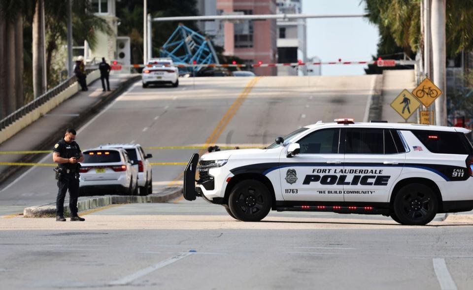 The crane piece fell during a busy traffic period in Fort Lauderdale (AP)