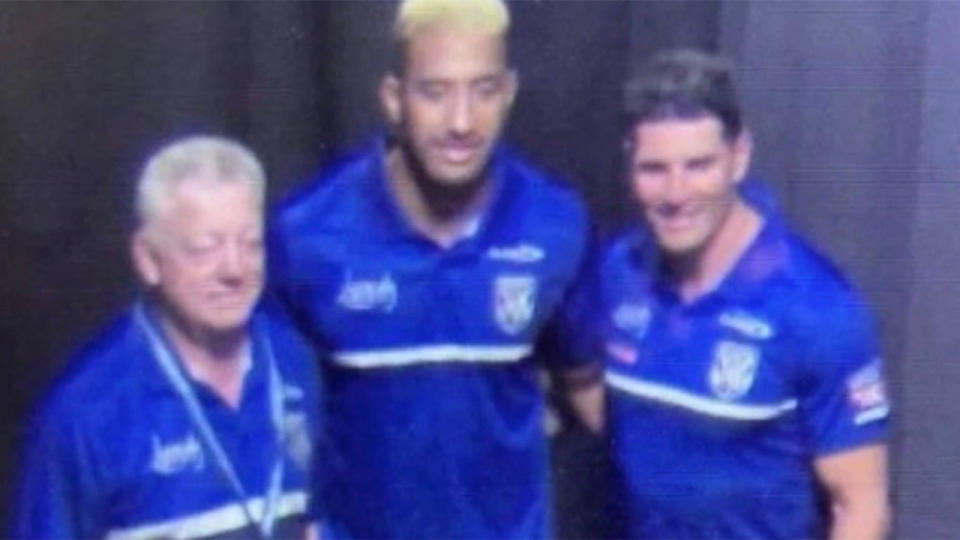 The leaked photo showed Bulldogs supremo Phil Gould (left) and coach Trent Barrett standing on either side of Viliame Kikau with the trio in Canterbury colours. Pic: Twitter