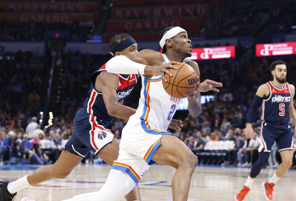 Feb 23, 2024; Oklahoma City, Oklahoma, USA; Oklahoma City Thunder guard Shai Gilgeous-Alexander (2) drives to the basket against the Washington Wizards during the second half at Paycom Center. Mandatory Credit: Alonzo Adams-USA TODAY Sports