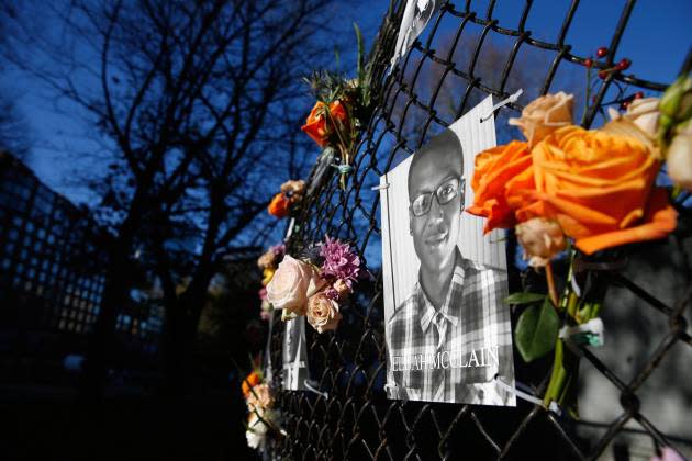  A photo of Elijah McClain as part of the "Say Their Names" memorial in Boston on Nov. 16, 2020. - Credit: Jessica Rinaldi/The Boston Globe via Getty Images