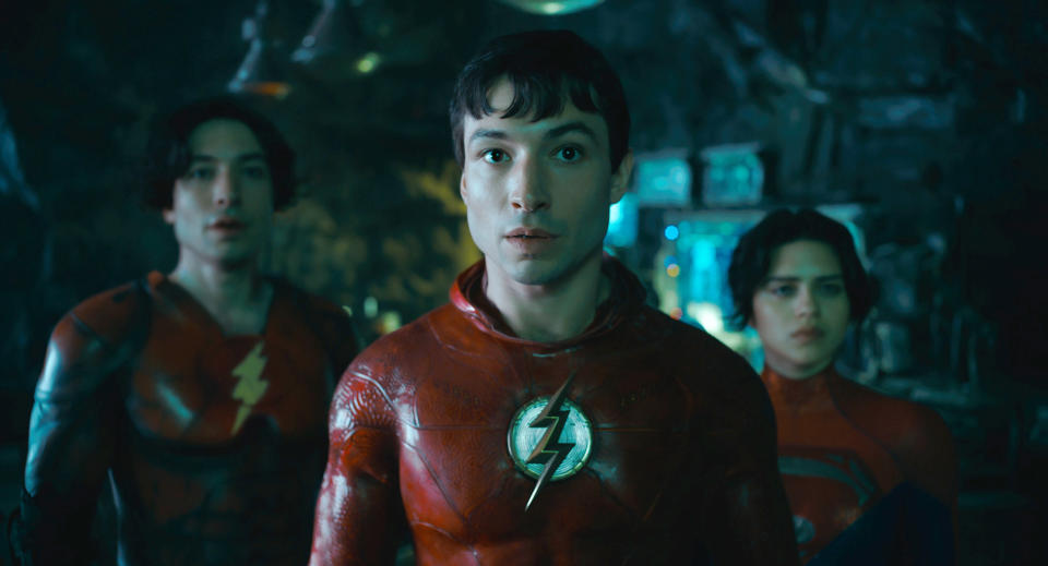 This image released by Warner Bros. Pictures shows Ezra Miller, from left, Ezra Miller and Sasha Calle in a scene from "The Flash." (Warner Bros. Pictures via AP)