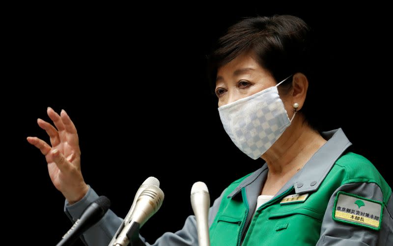 FILE PHOTO: Tokyo Governor Yuriko Koike attends a joint news conference with Japan's Economy Minister Yasutoshi Nishimura in Tokyo