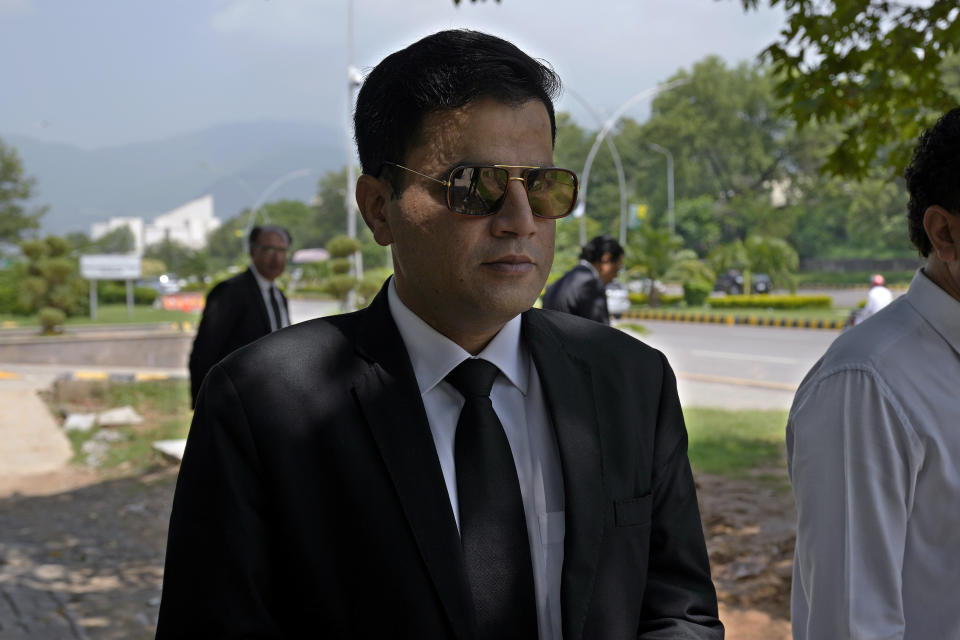 Naeem Haider Panjutha, a lawyer of Pakistan's former Prime Minister Imran Khan's legal team, arrives at a court to file petition against Khan's conviction, in Islamabad, Pakistan, Tuesday, Aug. 8, 2023. The lawyers for Khan petitioned a top court in the capital, Islamabad, on Tuesday, seeking the suspension of his conviction and sentencing of three years in jail in a graft case and requesting his release, a spokesman for the former premier's legal team said. (AP Photo/Anjum Naveed)